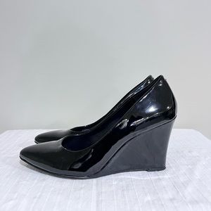 Black faux patent leather BCBGenration heels